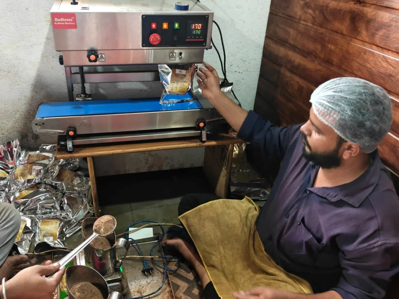 PNG Associates packing and sealing operation · Vijayapura