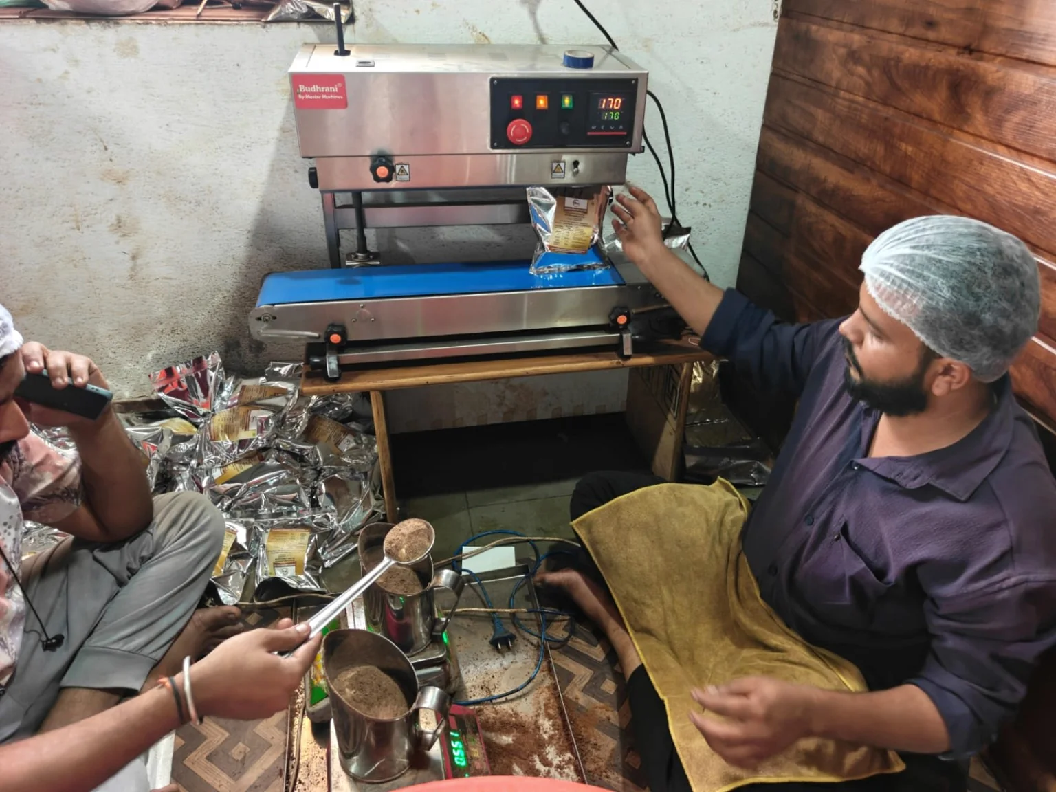 Actual PNG Associates sealing and packing operation